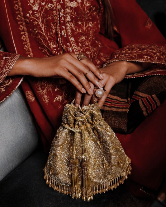 Bridal potli bag with sequins, beadwork and embellished tassel detailing