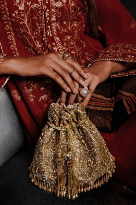 Gold embroidered handbag