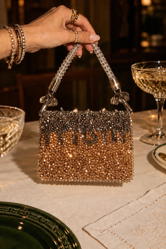 Elegant gold and silver beaded mini clutch for women, designed for glamorous evening occasions.