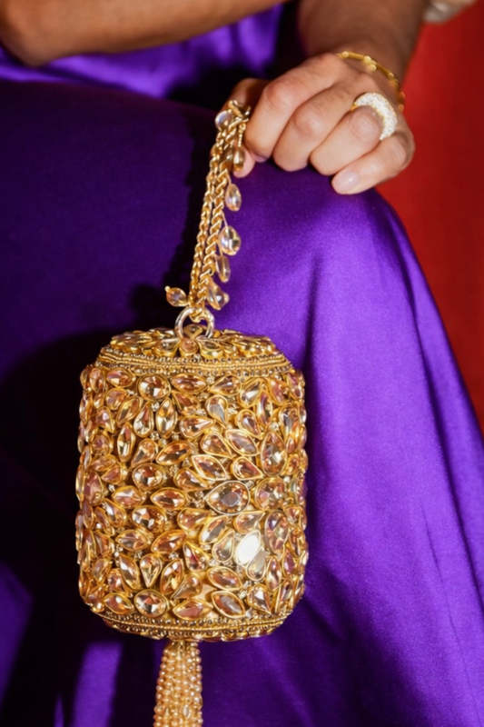 Golden mini bag for haldi ceremonies and wedding celebrations
