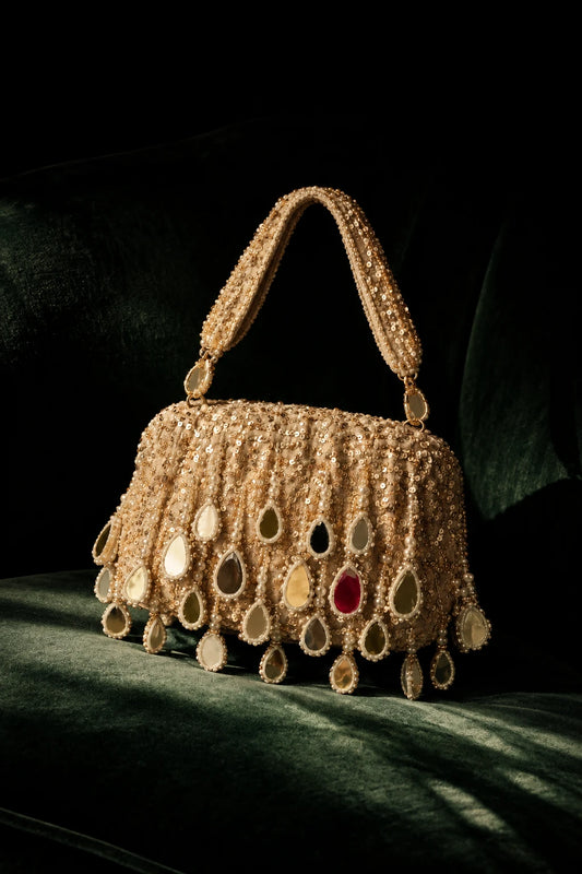 Golden mirror shoulder bag for haldi ceremonies and festive celebrations