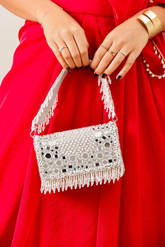Handcrafted silver festive bag with premium mirror embroidery
