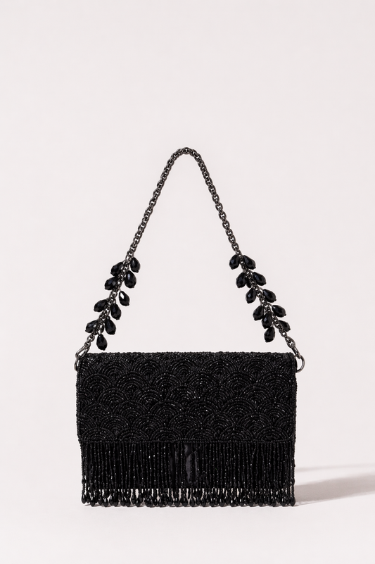 Black beaded party purse inspired by glamorous cocktail nights and festive celebrations
