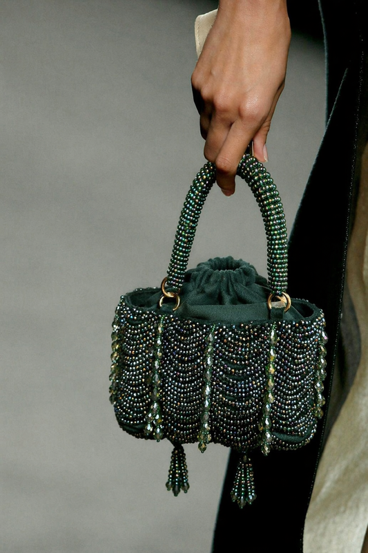 Dark green evening purse inspired by glamorous celebrations and cocktail styling