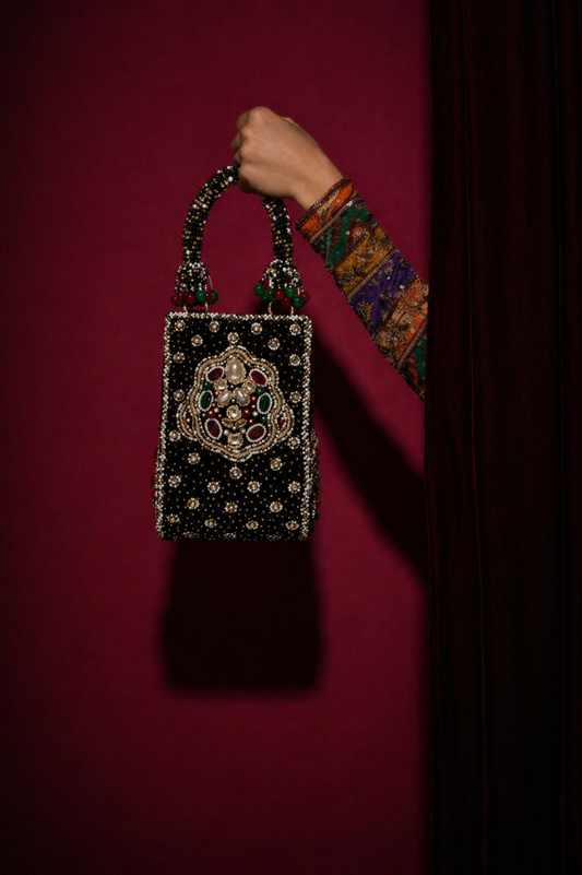 Traditional jewel-inspired evening purse designed for weddings and celebration styling