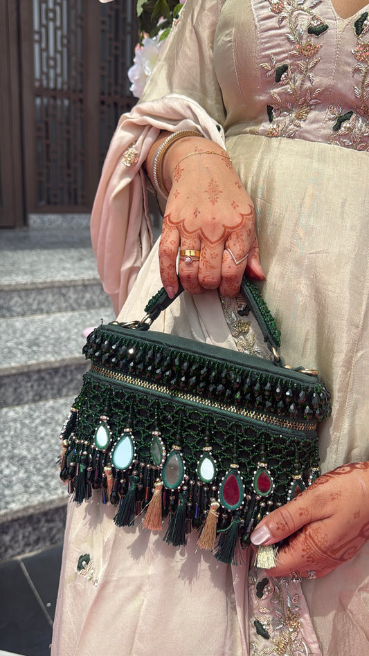 Green mehendi vanity bag for women with handcrafted detailing