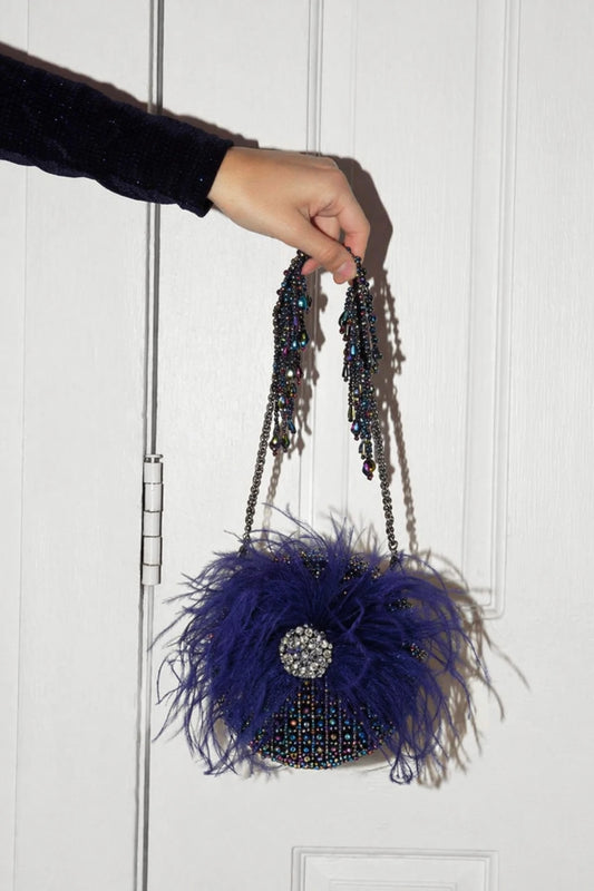 Multi colour round bag for women with statement detailing