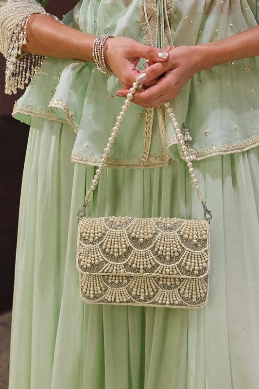 Pearl Haldi shoulder bag with scalloped bead detailing