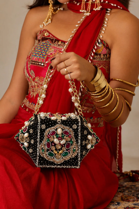 Potli bag for wedding occasions featuring jewel toned embellishments