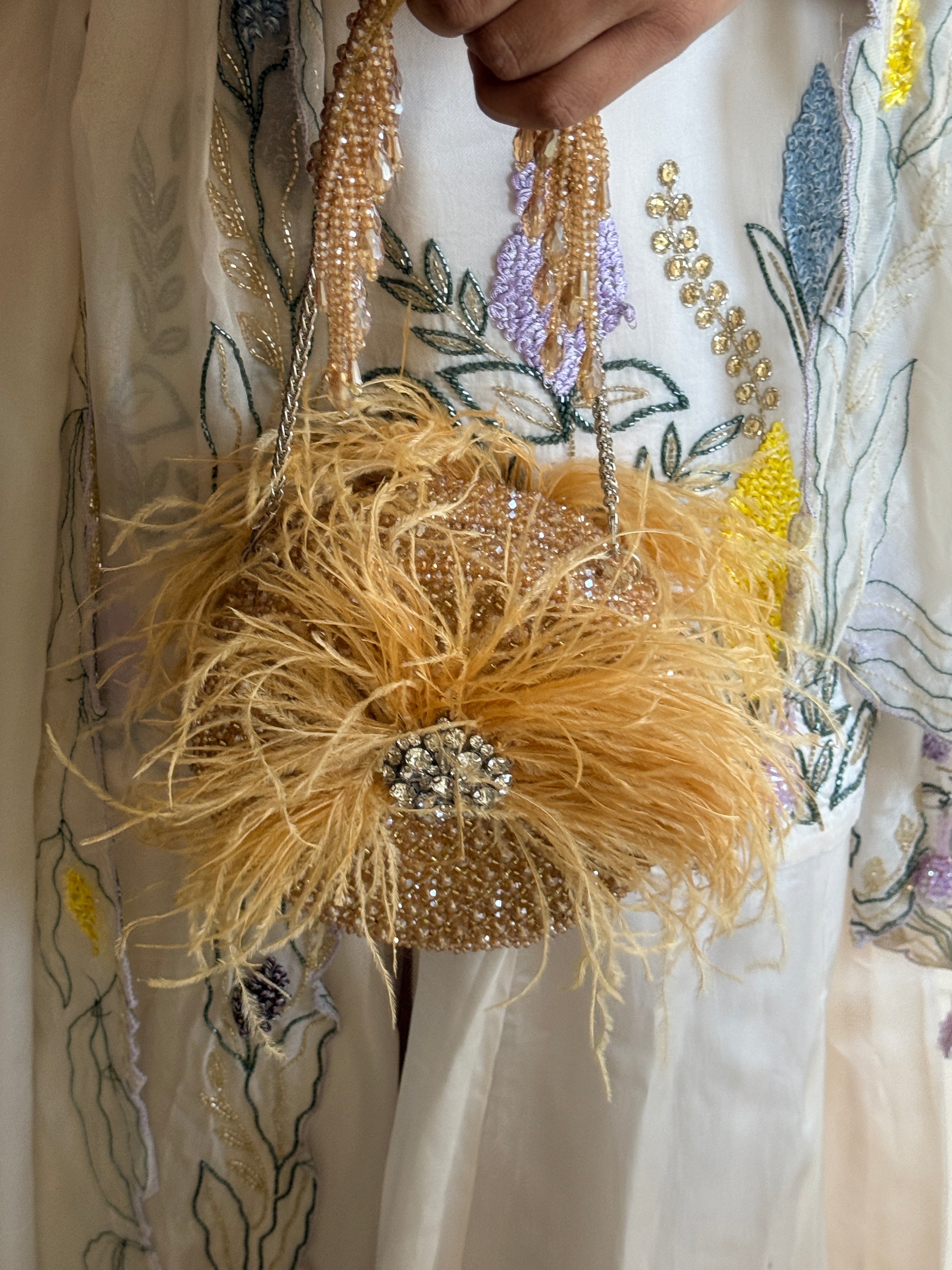 Feather Burst Golden Round bag