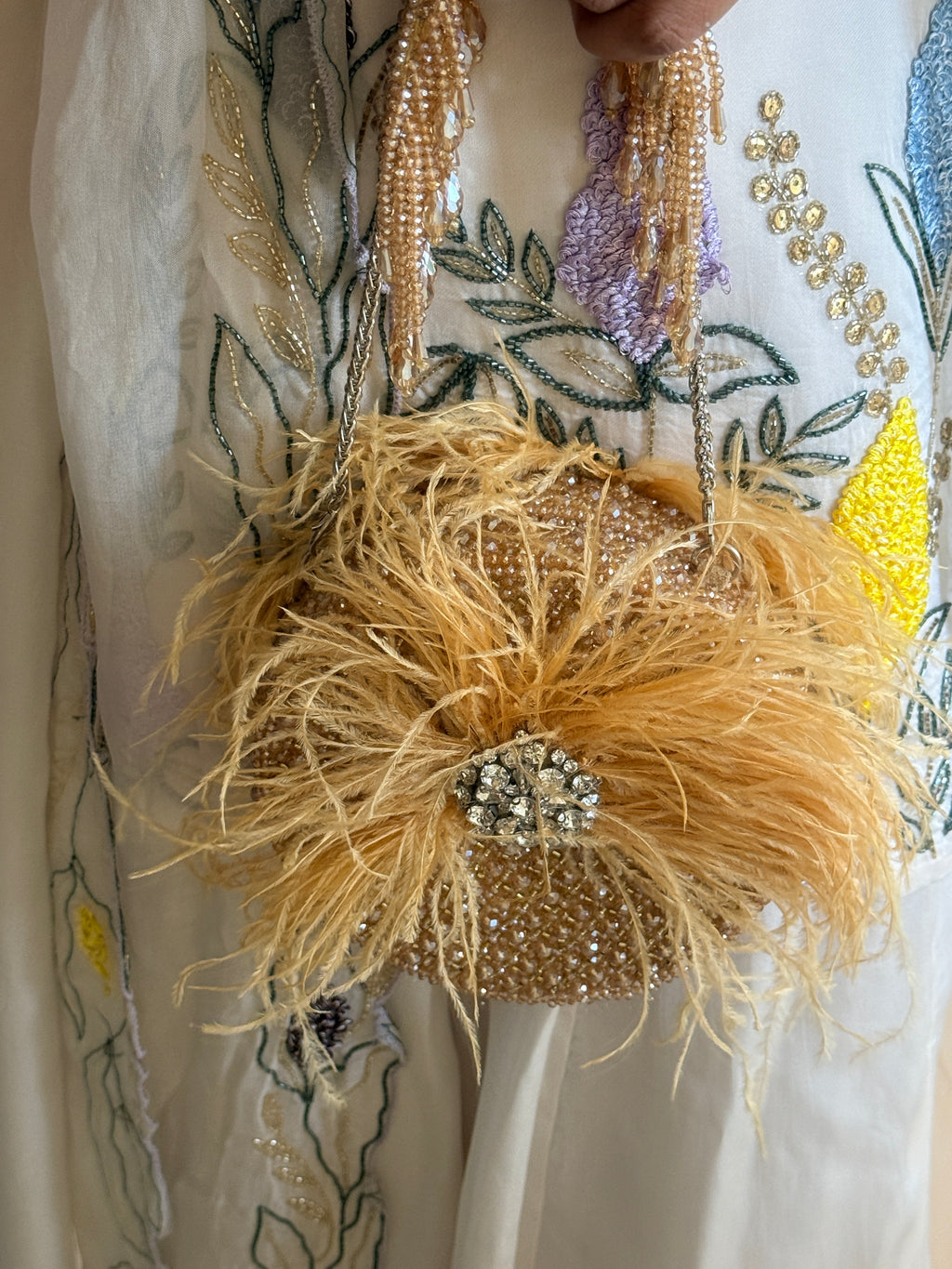 Feather Burst Golden Round bag