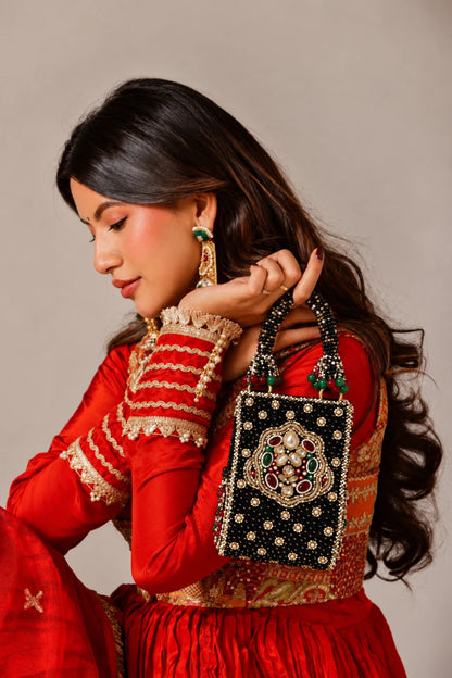 Black festive clutch bag for women with intricate handcrafted embellishments