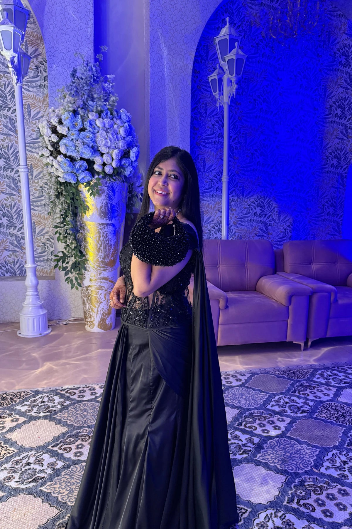 Black hobo bag styled with an evening party dress
