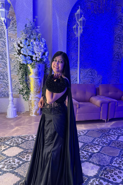 Black hobo bag styled with an evening party dress