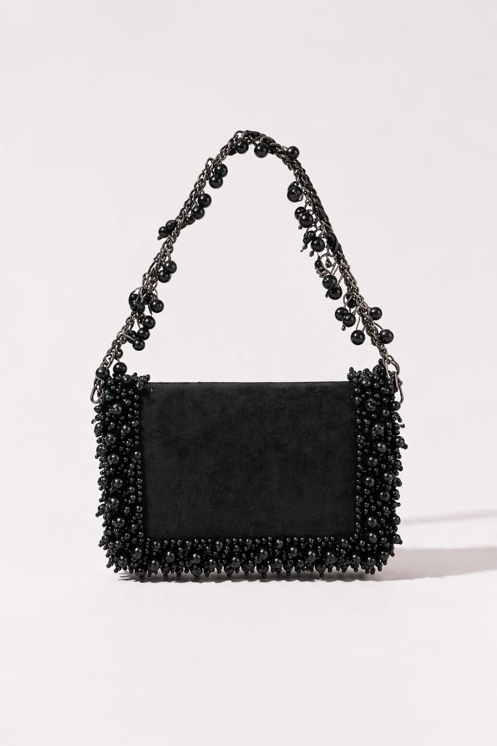 Black shoulder bag for women with handcrafted embellishments