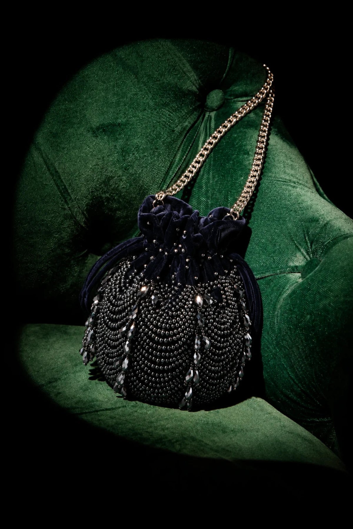 Handcrafted charcoal blue party purse combining rich texture with modern evening glamour