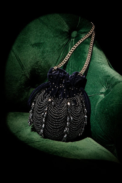 Handcrafted charcoal blue party purse combining rich texture with modern evening glamour