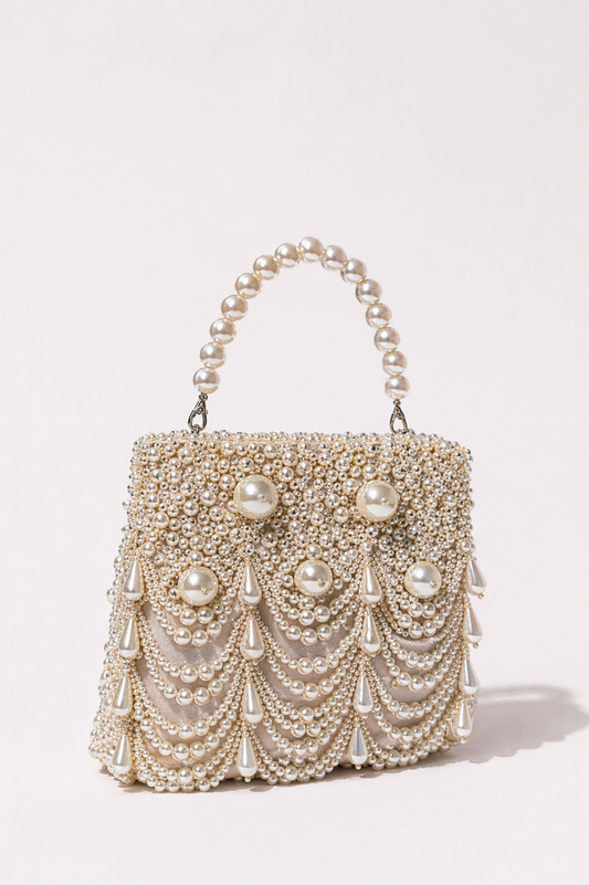 Bridal handbag for wedding occasions with sculpted pearl handle
