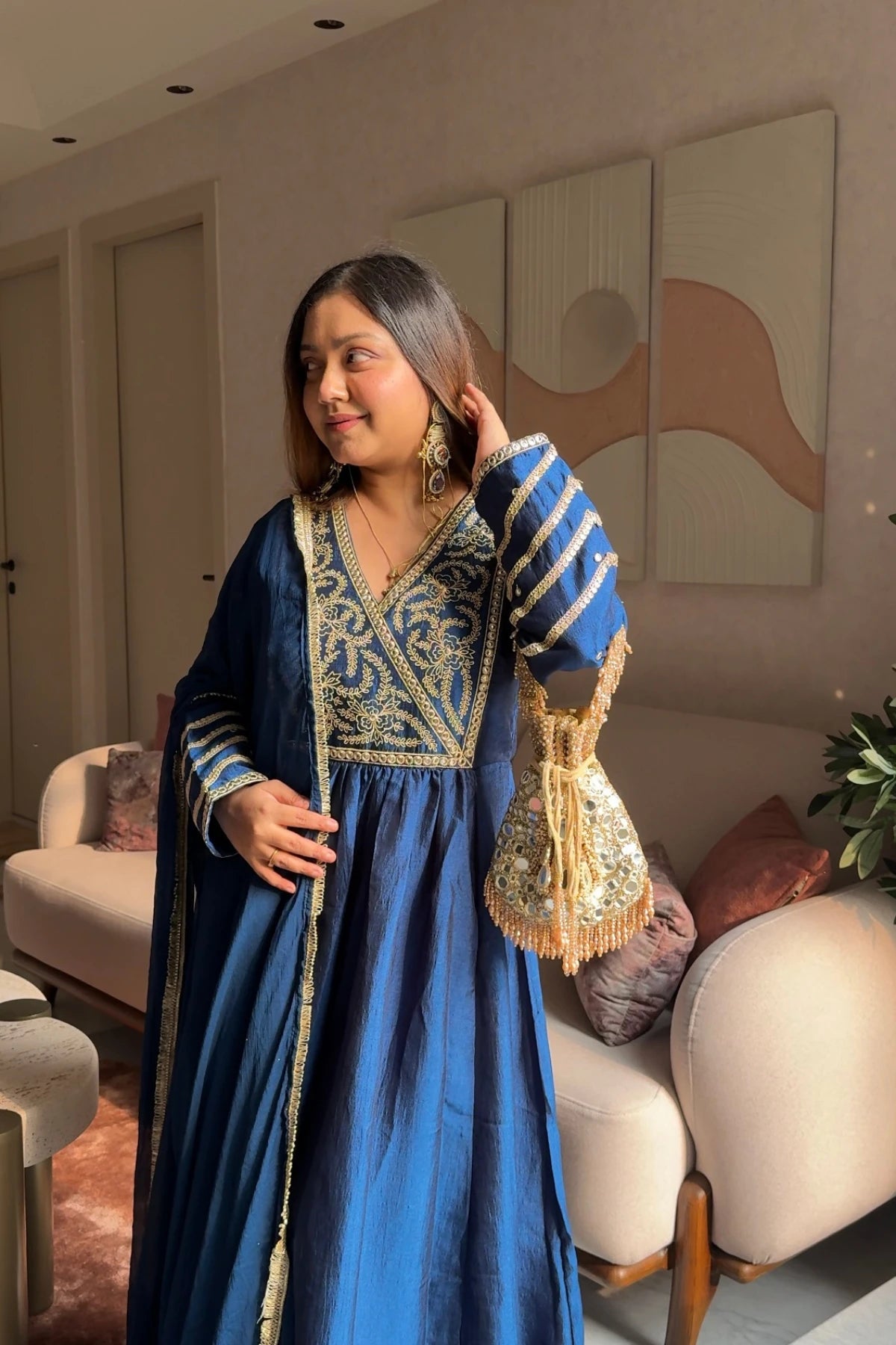 Golden mirror work potli bag for bridal wedding celebrations