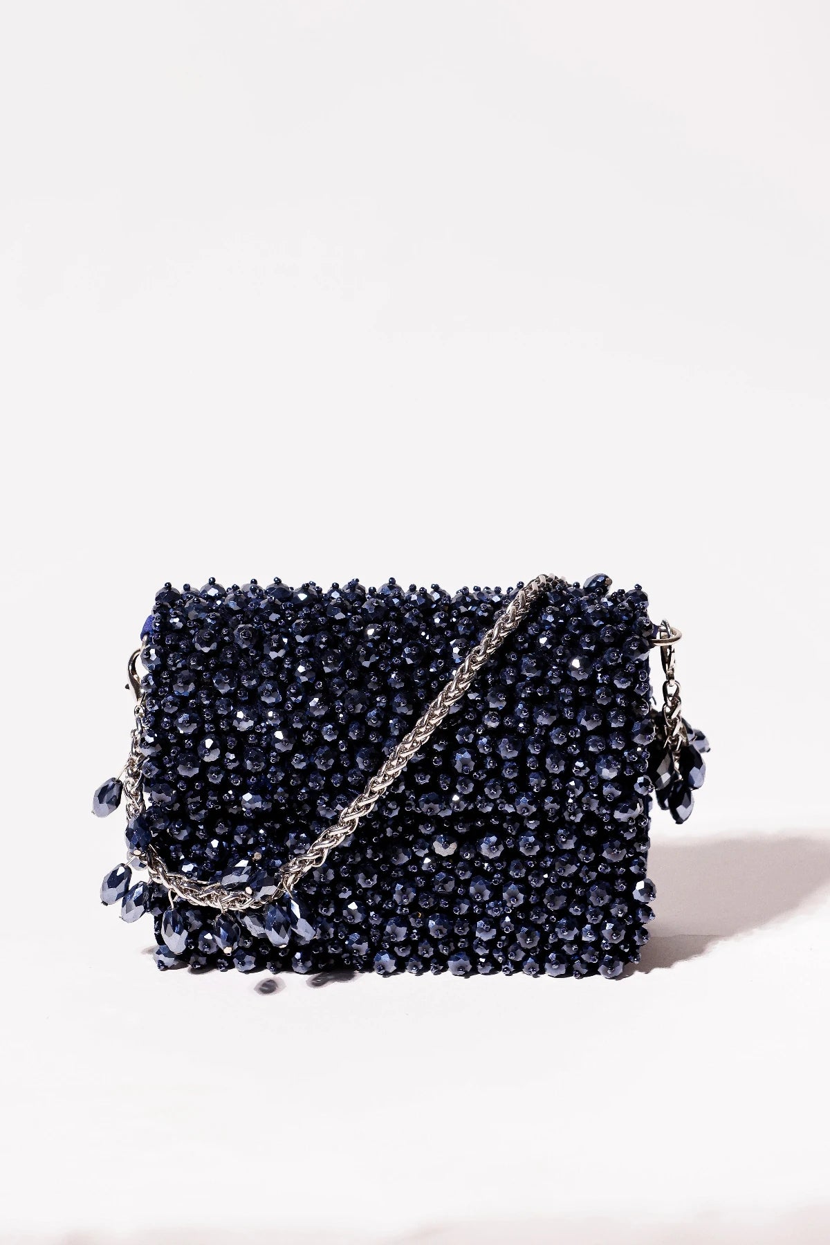 Charcoal blue shoulder bag for sangeet ceremonies and wedding celebrations