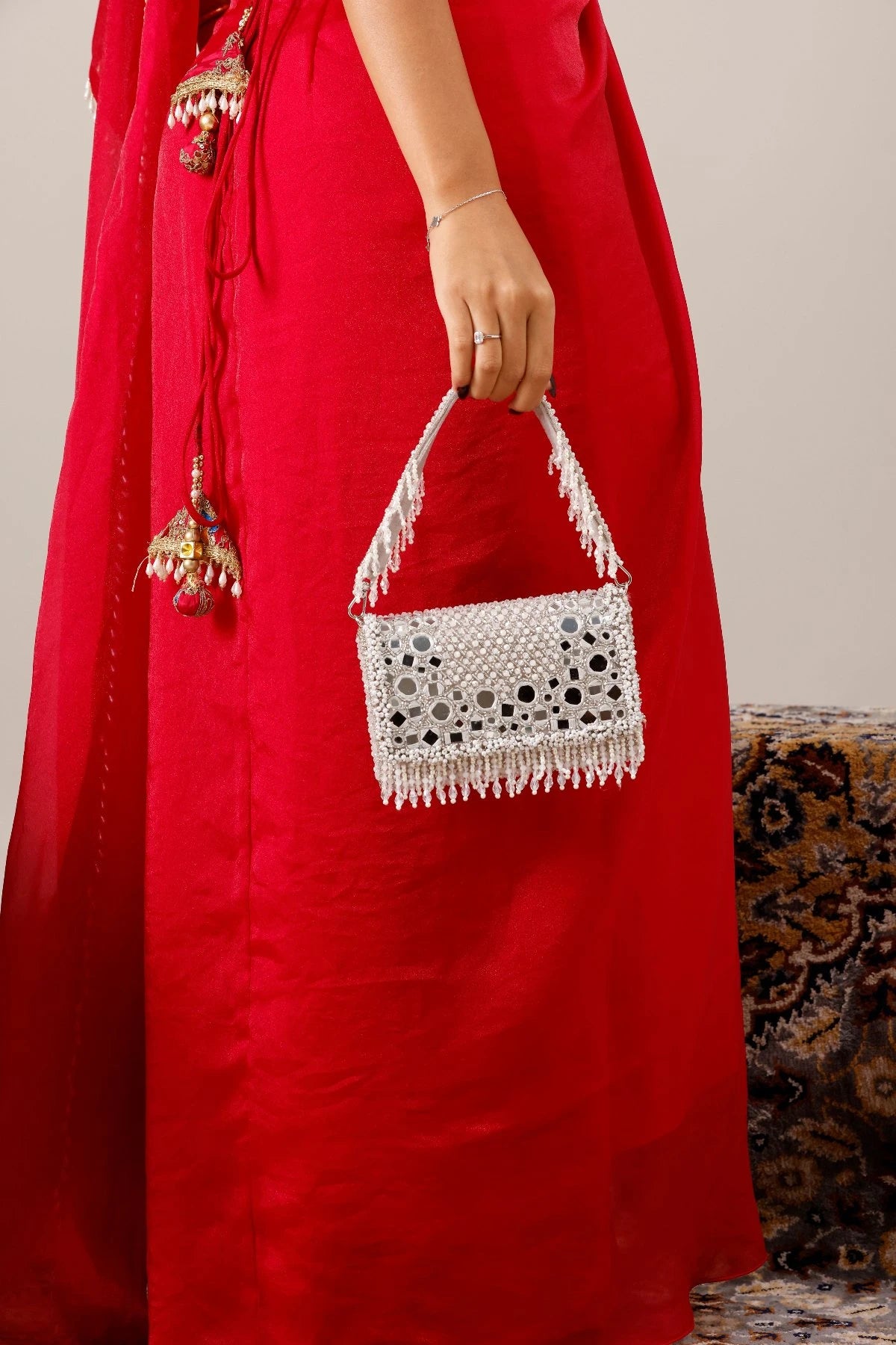 Designer festival shoulder bag with elegant mirror detailing
