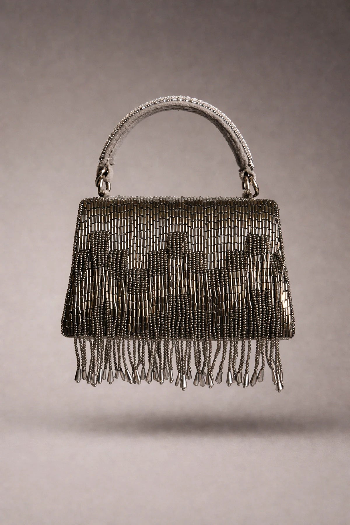 Designer grey clutch bag with structured silhouette