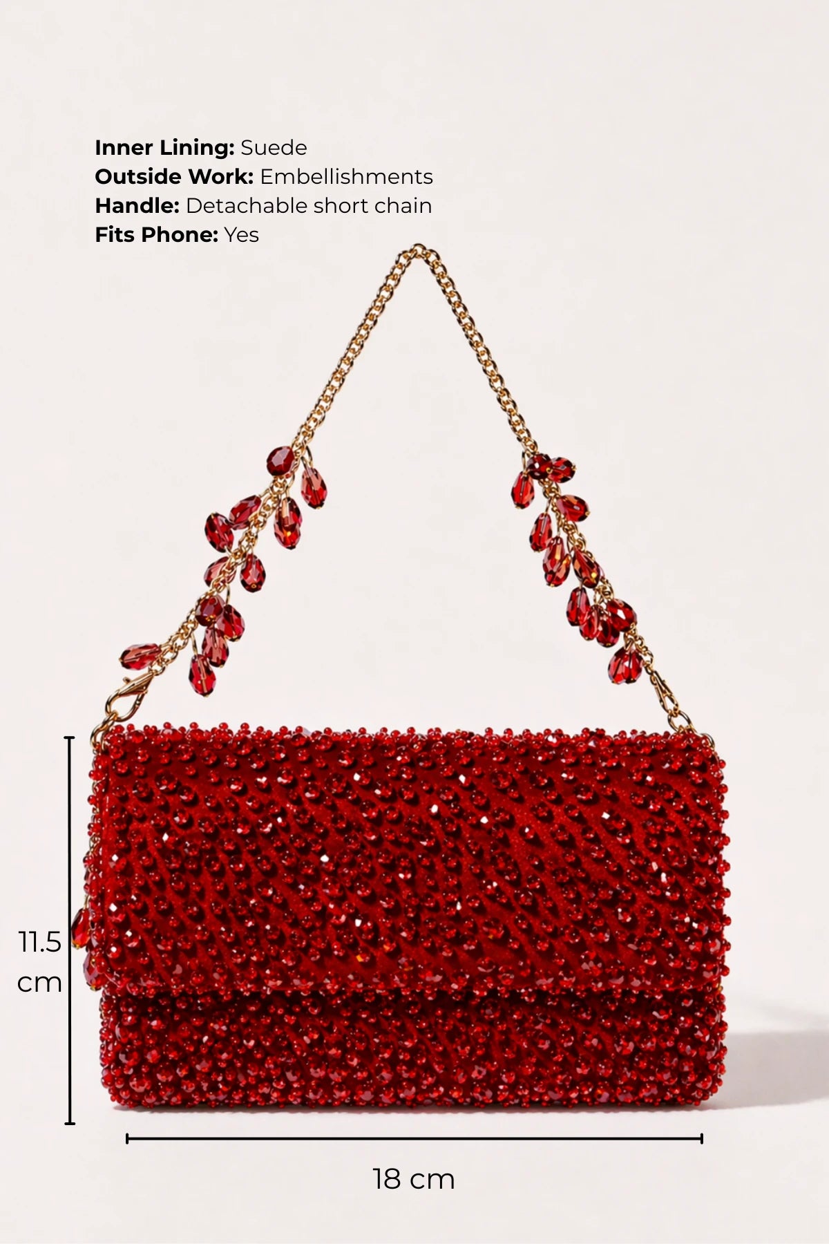 Designer red shoulder bag styled with a lehenga for festive celebrations