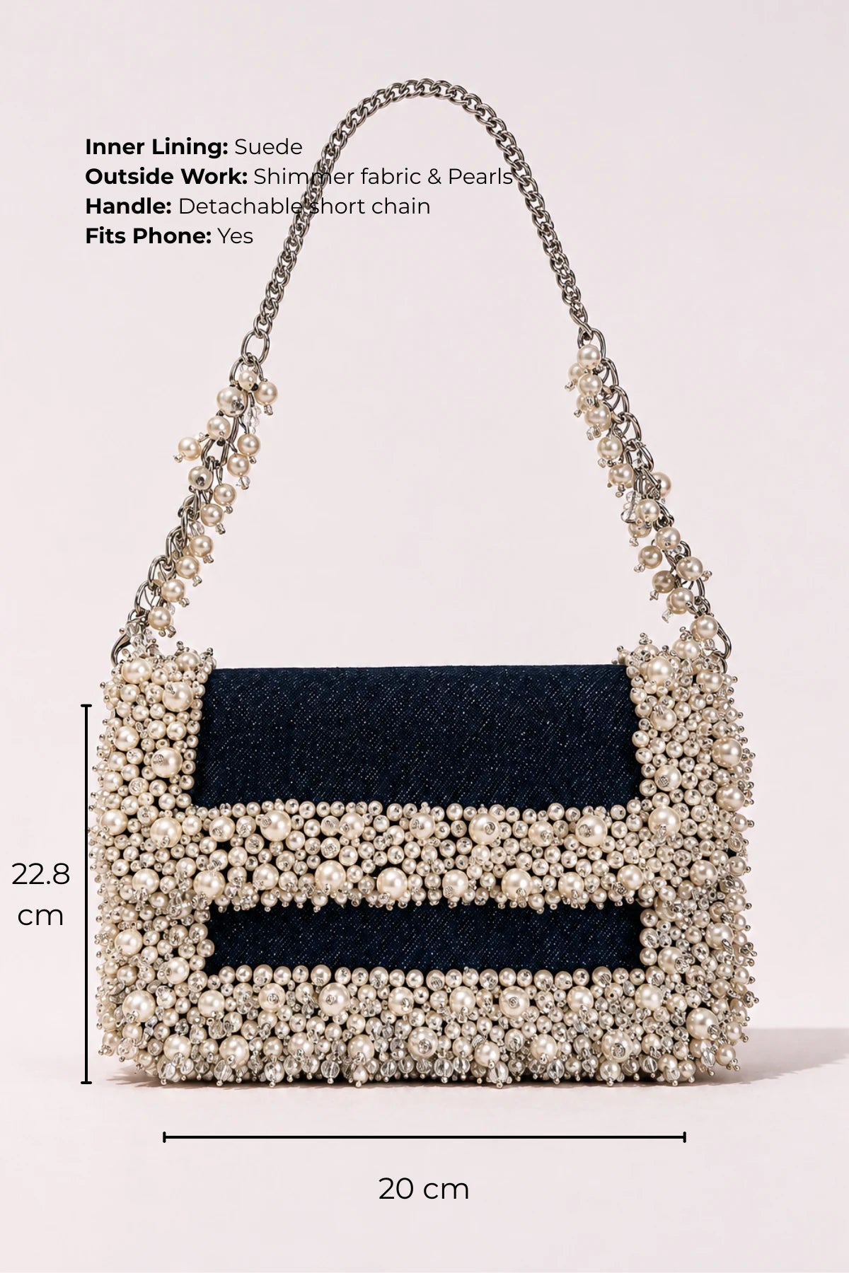 Designer shoulder bag with handcrafted pearl embellishments