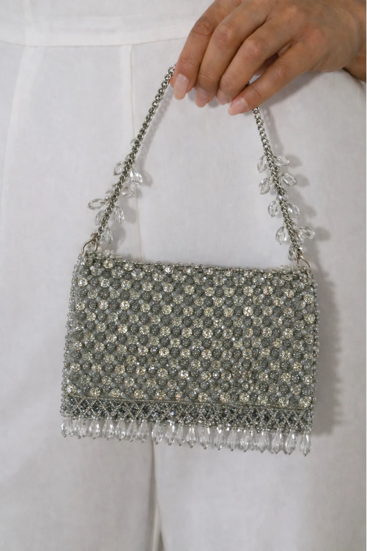 Designer silver shoulder bag for sarees, lehengas and festive outfits