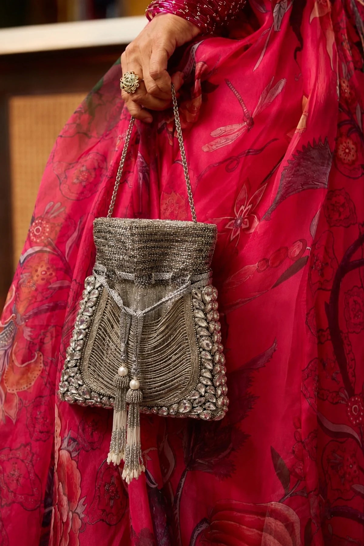 Designer silver potli bag for festivals and festive celebrations