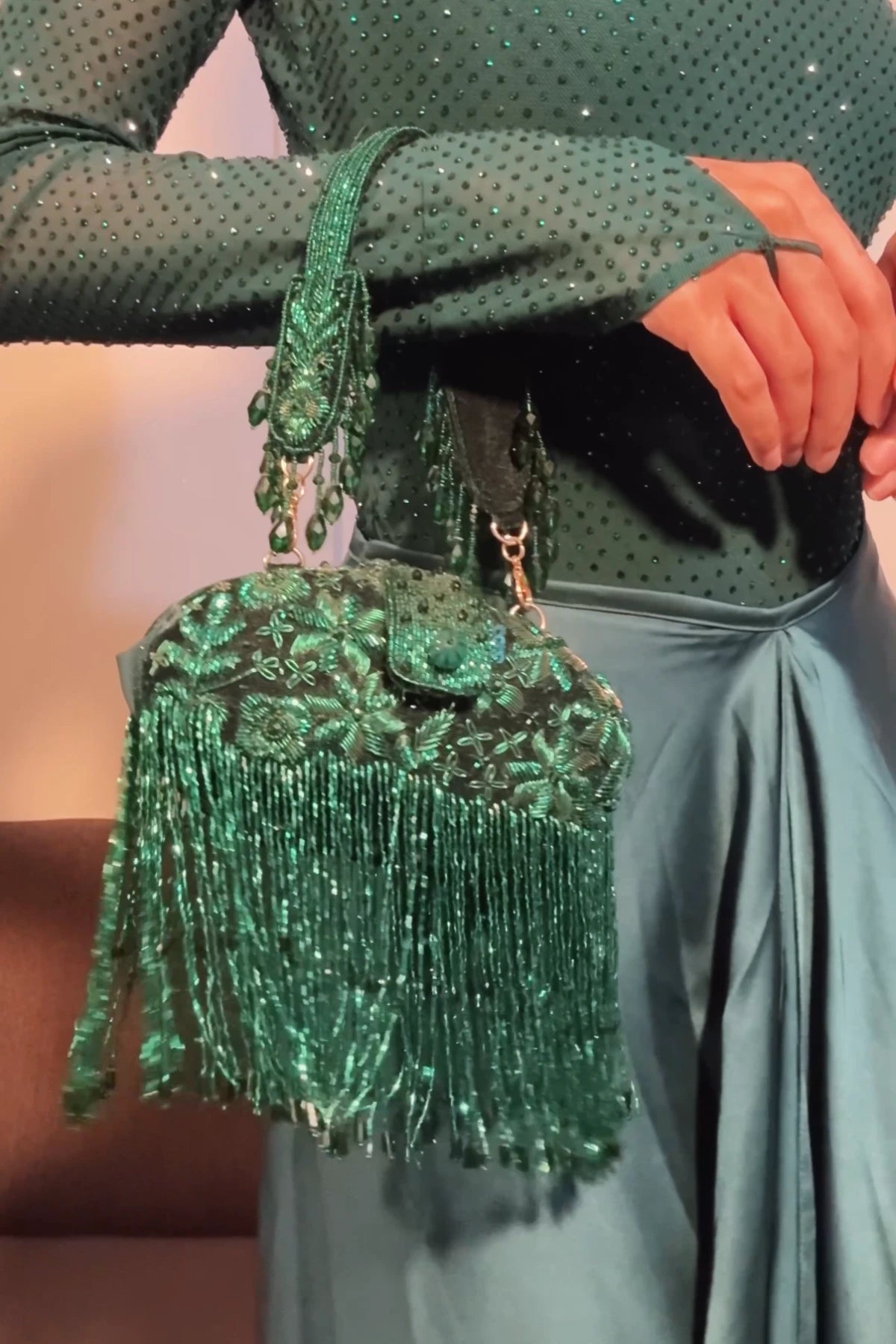 Emerald green clutch with handcrafted fringe and bead embroidery
