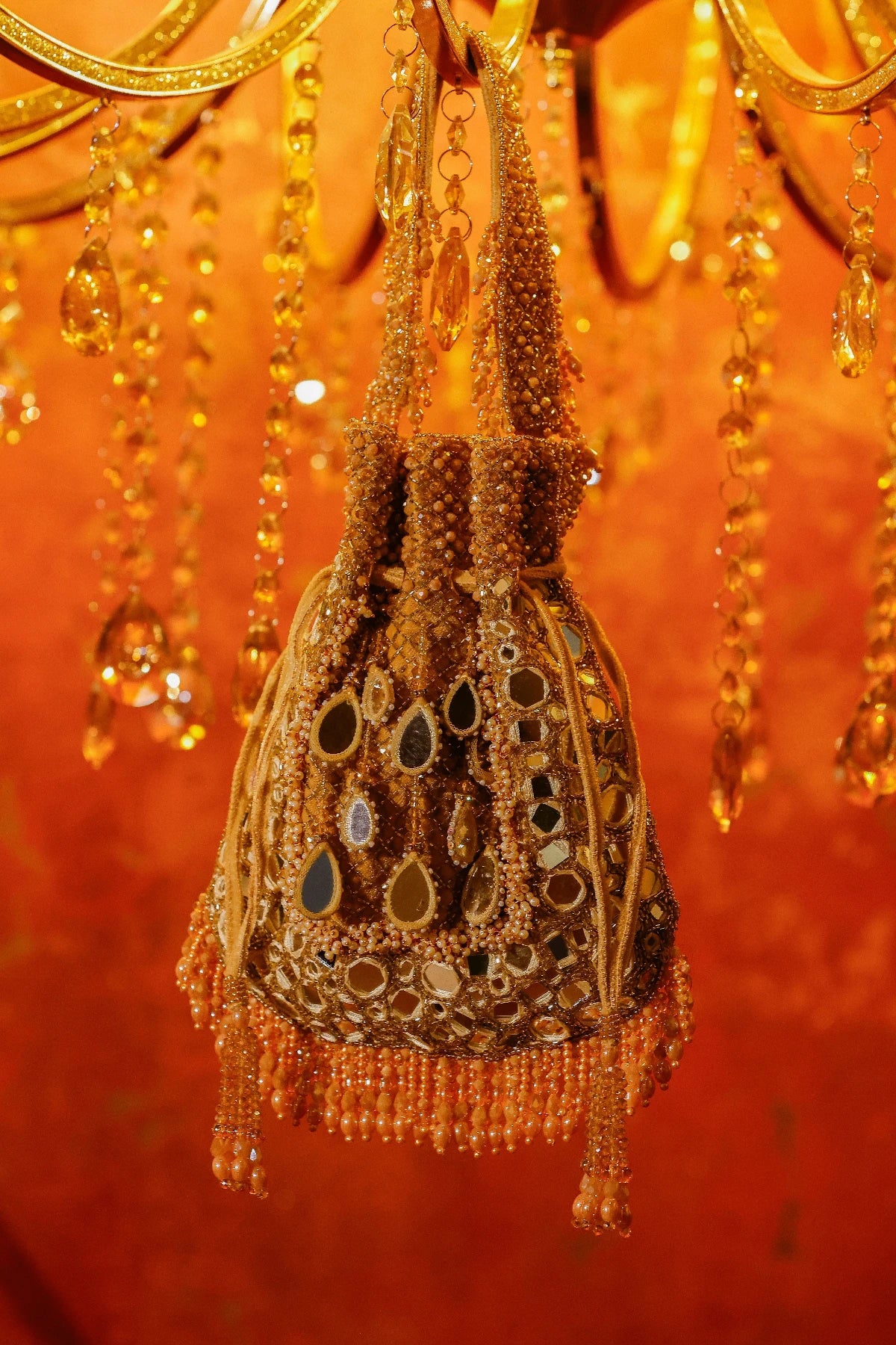 Golden ethnic potli bag for traditional wedding outfits