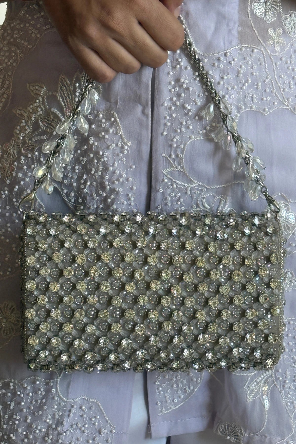 Silver festive bag for traditional Indian outfits