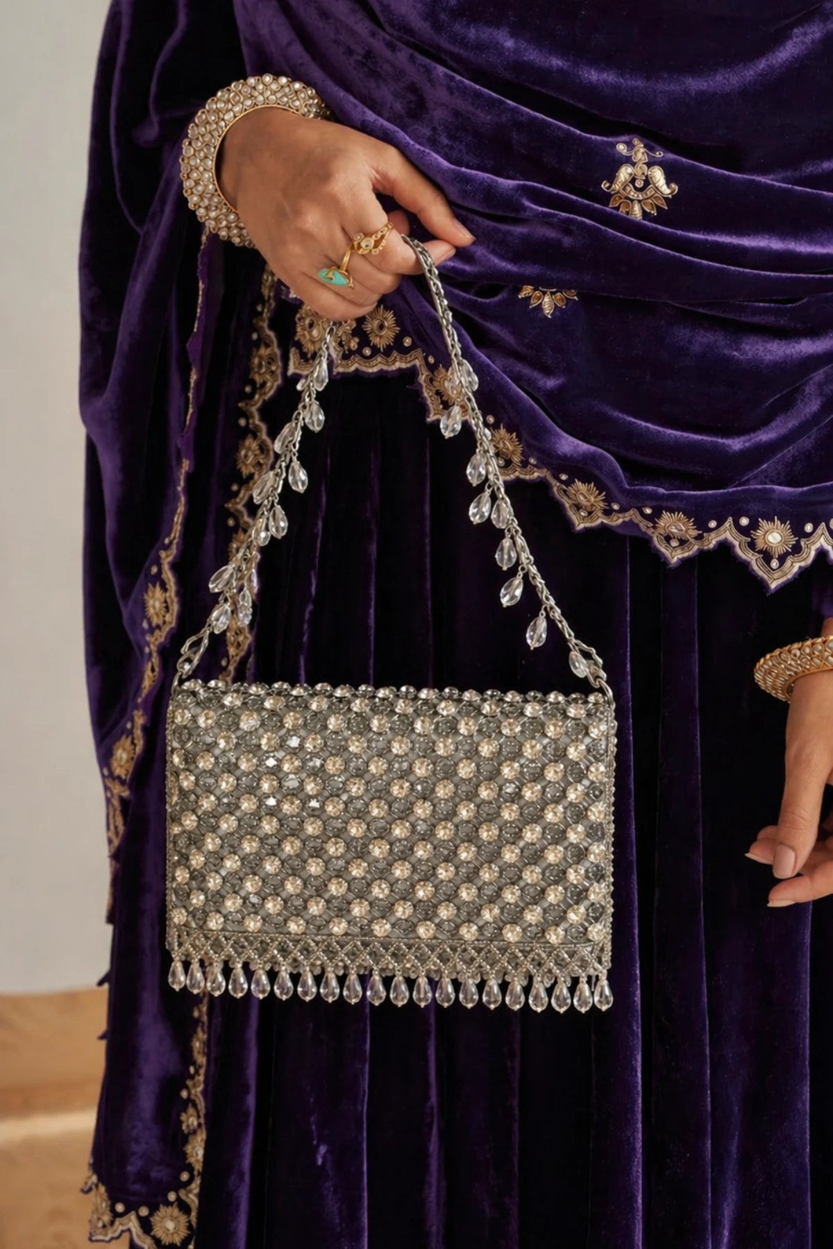 Silver festive shoulder bag for women with handcrafted embellishments