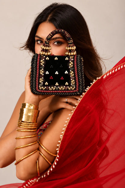 Gift bag for women with handcrafted embellishments and floral patterns