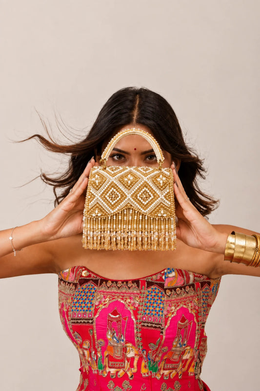 Golden clutch bag for weddings and festive occasions