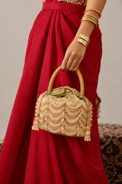 Golden clutch bag for women for festive occasions