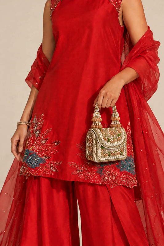 Designer golden mini handbag with handcrafted pearl and bead embellishments for weddings and festive occasions.