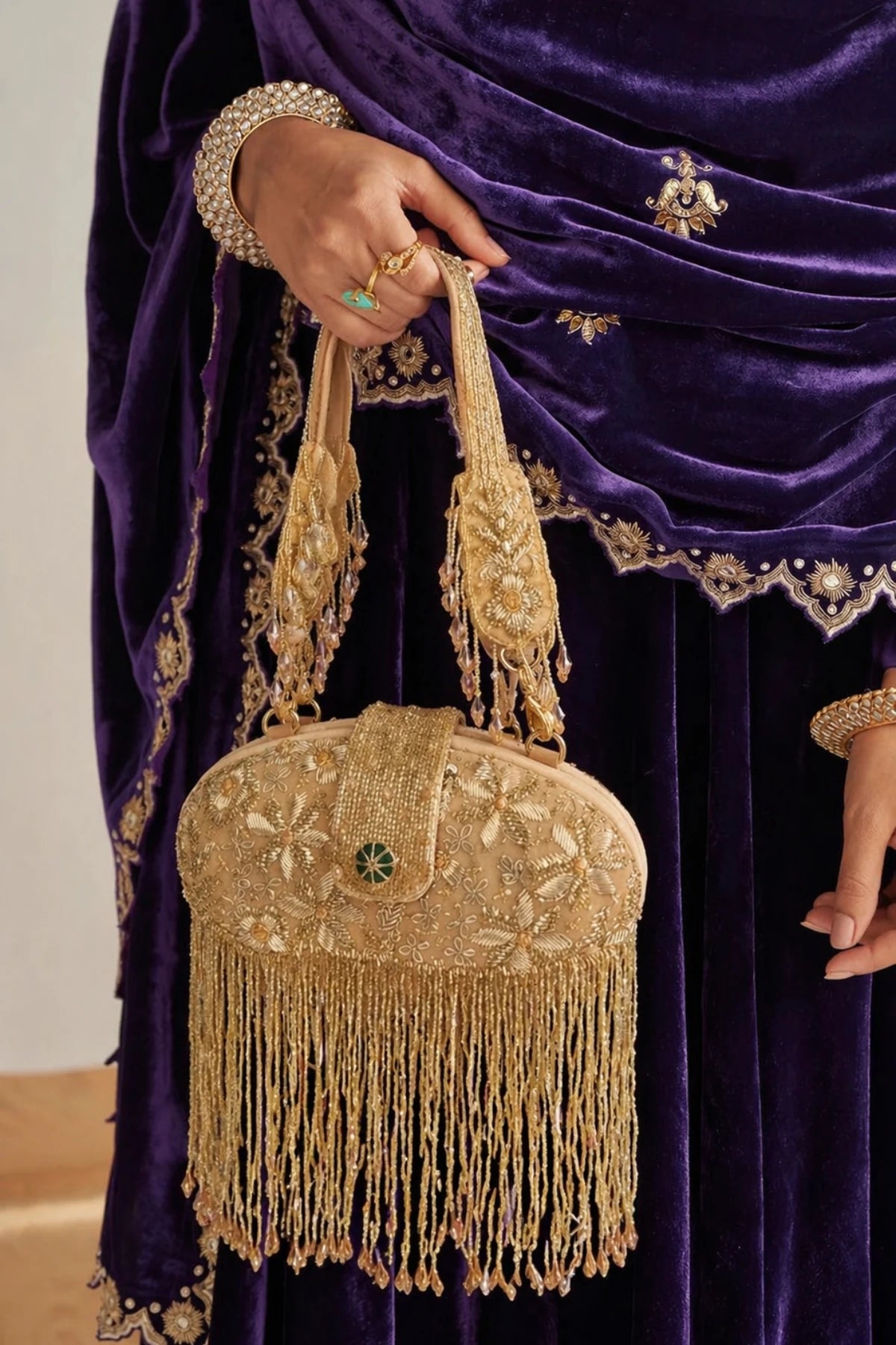 Golden festive clutch bag for wedding functions and celebrations