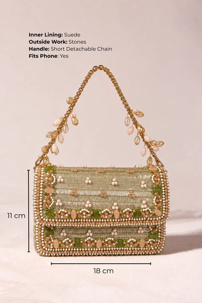 Golden embellished handbag designed to complement yellow lehengas, floral outfits, shararas and sarees for Haldi ceremonies.