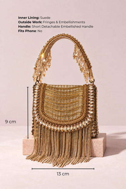 Handcrafted golden mini handbag with crystal and fringe embellishments, ideal as a wedding gift.