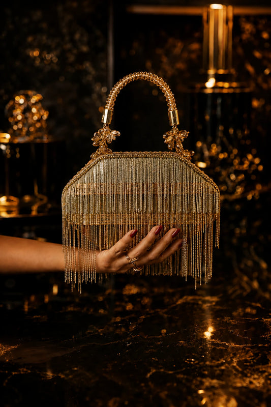 Golden wedding clutch for women with statement chain fringe detailing