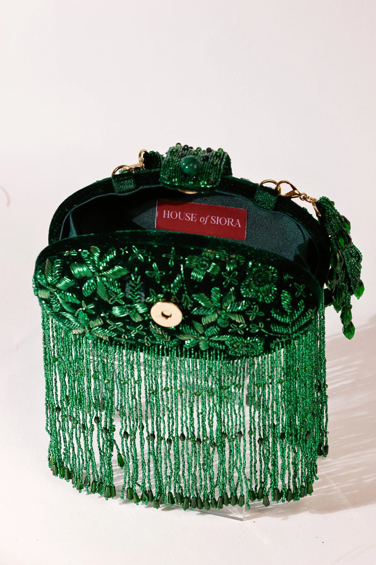 Green clutch bag for mehendi ceremonies and festive celebrations