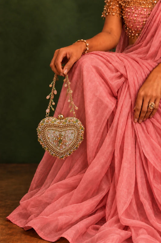 Gulabo Pastel Heart Bag featuring handcrafted pastel beads, pearls and stones, perfect for festivals and celebrations.