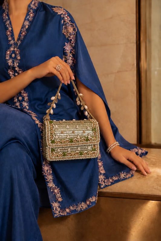 Gulshan Golden Bag featuring intricate multicoloured floral beadwork on a golden base, perfect for Haldi ceremonies and wedding festivities.