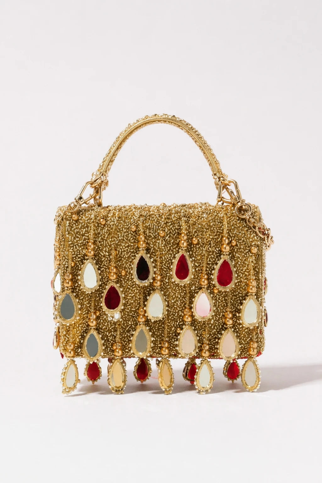 Golden flap bag for haldi celebrations with handcrafted embellishments