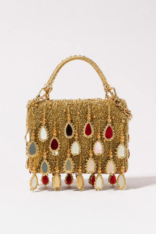 Golden flap bag for haldi celebrations with handcrafted embellishments