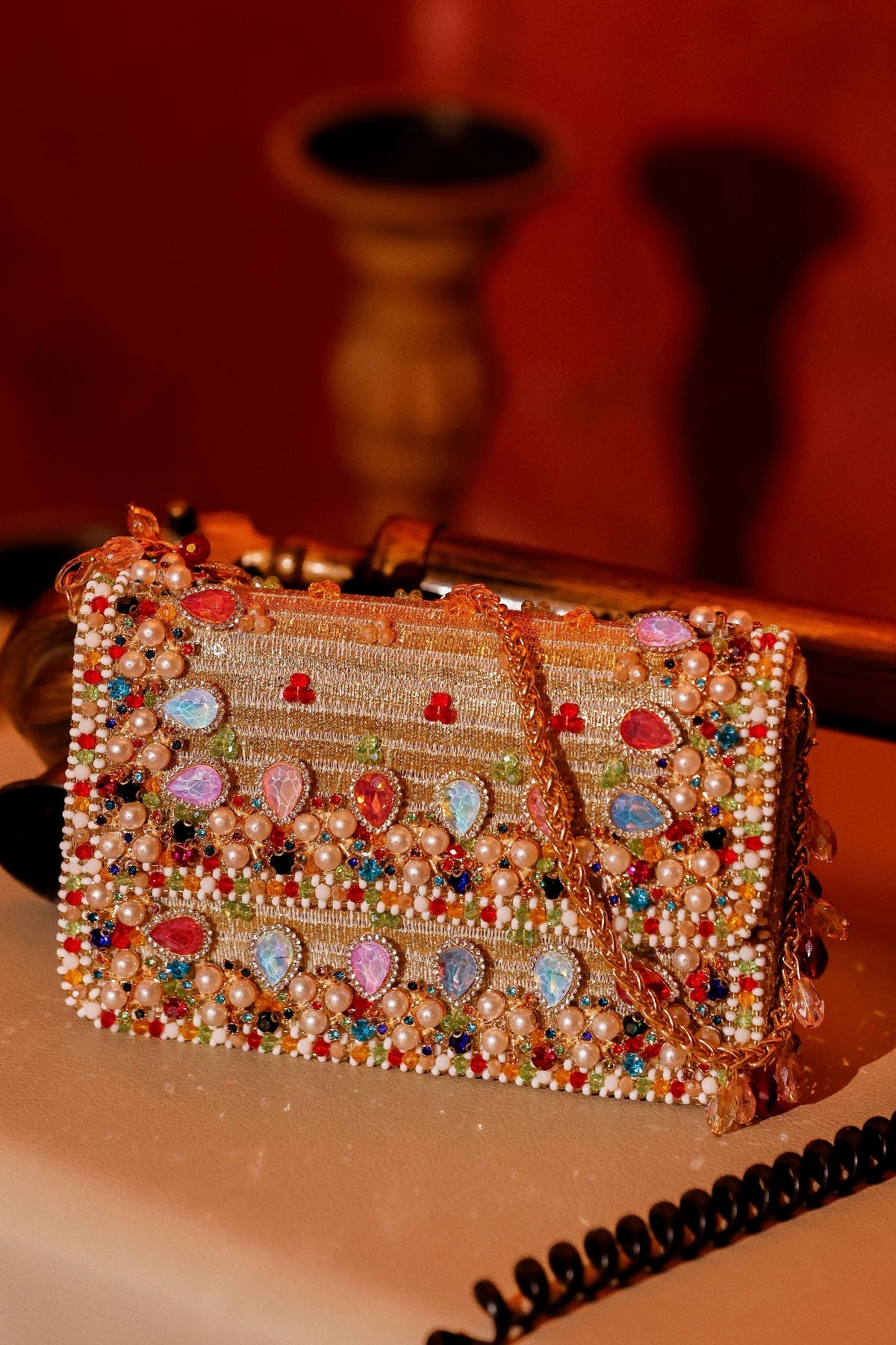 Handcrafted box shoulder bag with intricate multicolour beadwork