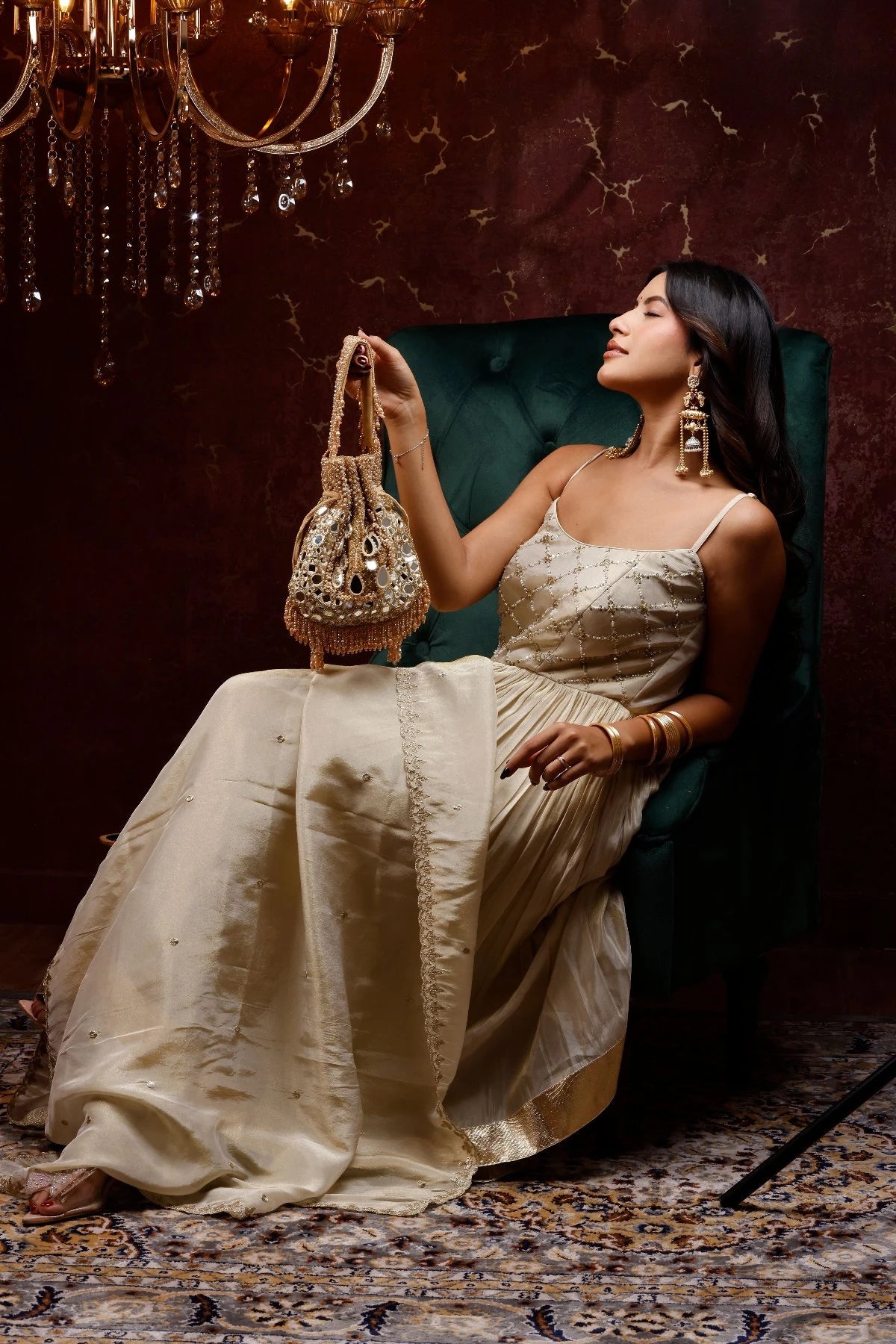Handcrafted mirror work potli bag with intricate bead detailing