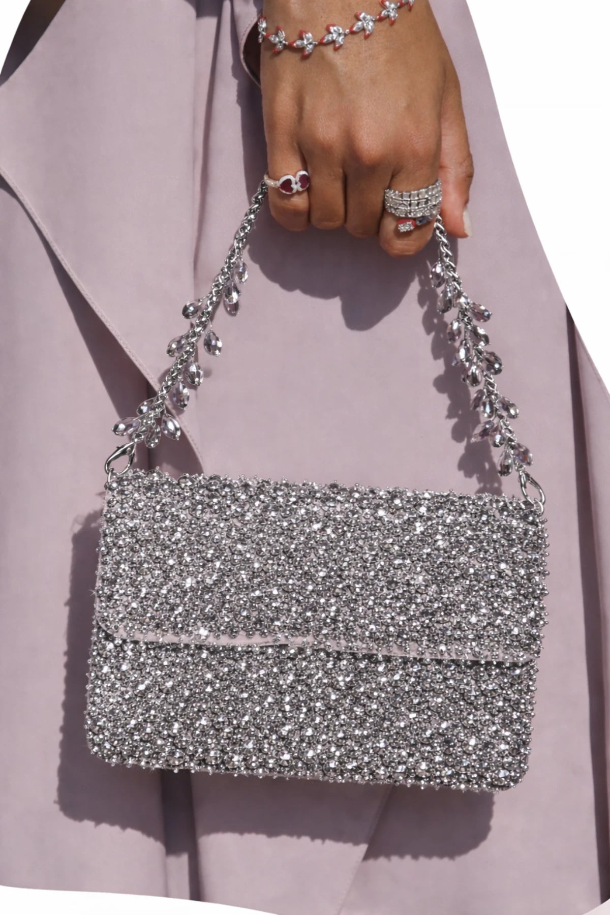 Handcrafted silver beaded handbag with premium detailing
